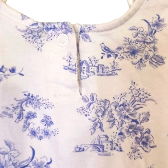 VITAMINS KIDS White and Light Blue Ruffle Romper with Floral/Small Town Patter - Picture 5 of 6